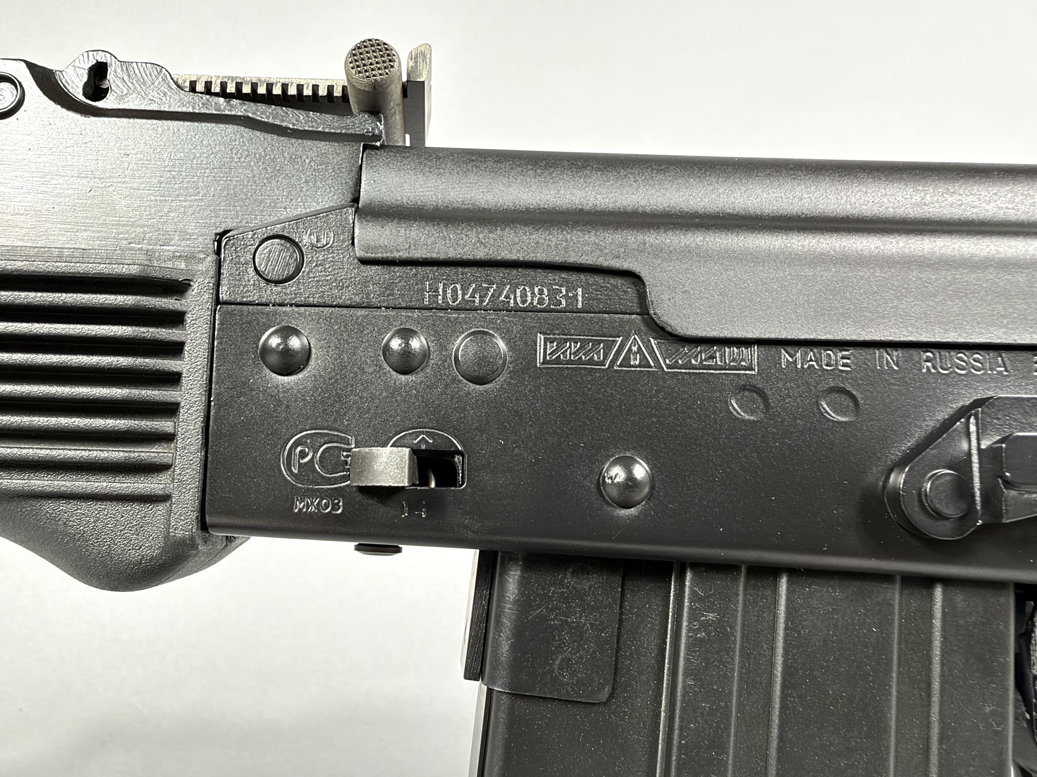 Left receiver: serial, Izhmash arrow-in-triangle, Made in Russia by Izhmash