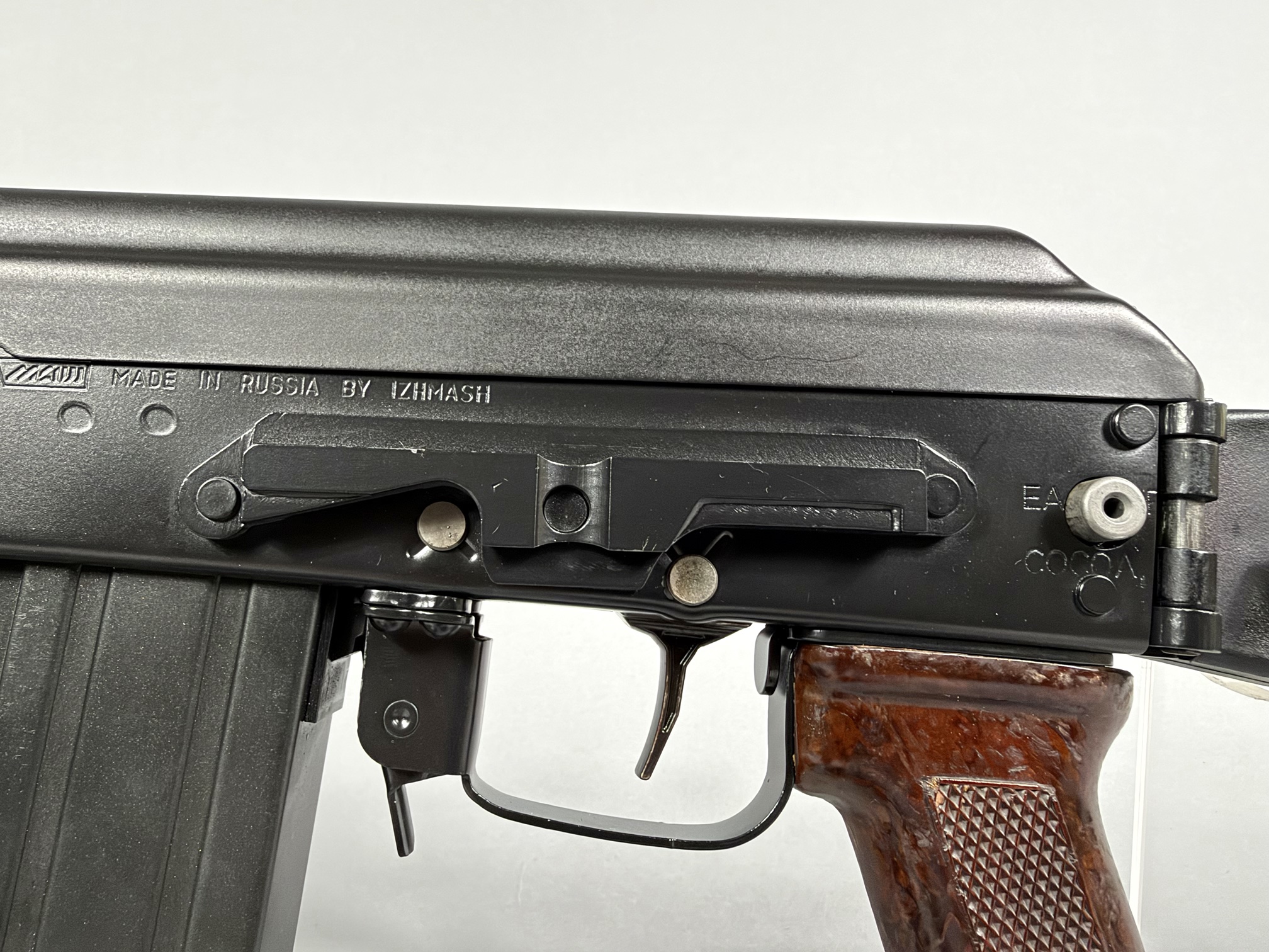 Left receiver: side optic rail, EAA Cocoa FL import mark, IGLIM trigger guard