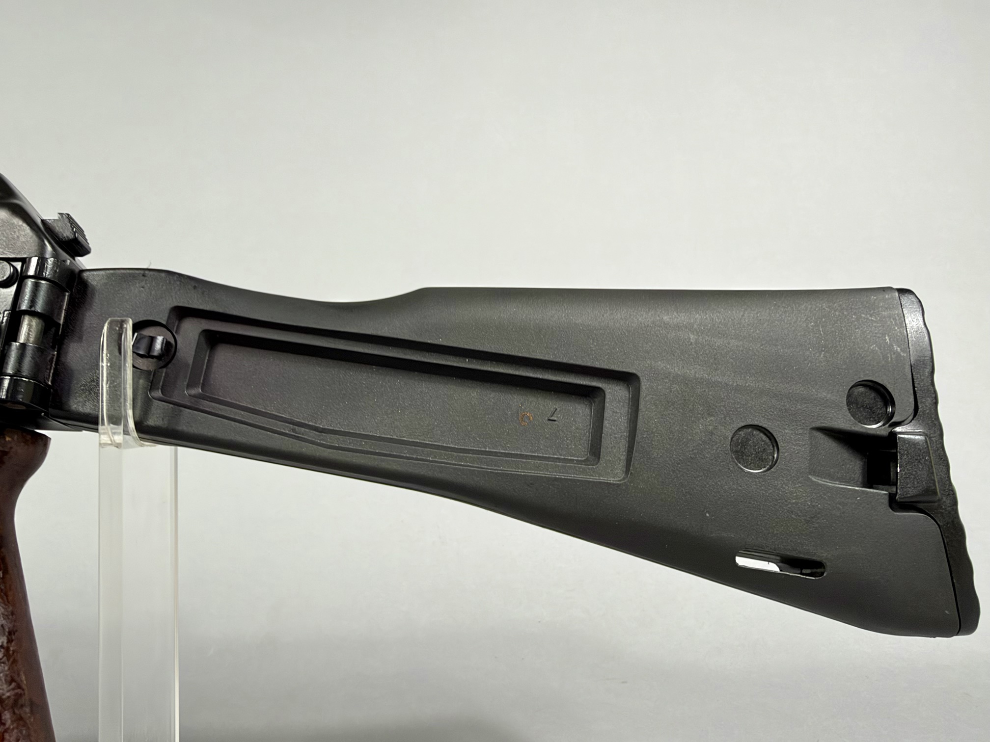 AK-100 series folding stock — left side